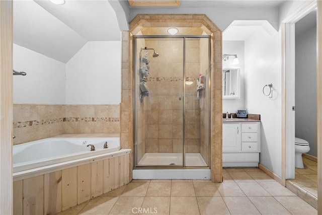 full bathroom featuring shower with separate bathtub, toilet, lofted ceiling, vanity, and tile patterned flooring