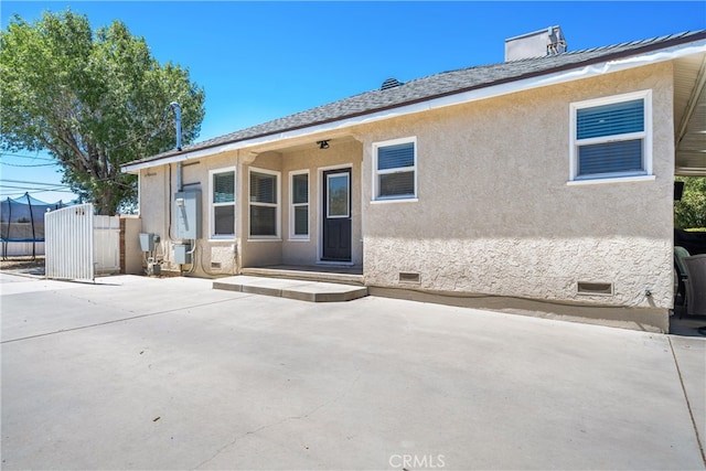 back of house featuring a patio