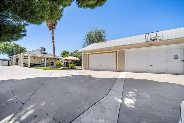 view of property exterior with a garage