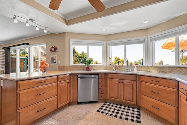 kitchen with ornamental molding, sink, kitchen peninsula, stainless steel dishwasher, and a textured ceiling