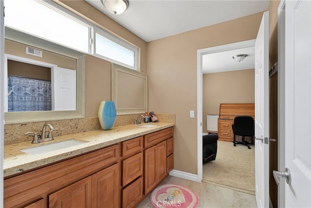 bathroom featuring vanity and tile patterned floors