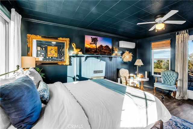 bedroom with wood-type flooring, ornamental molding, ceiling fan, and a wall unit AC