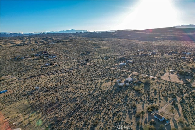 bird's eye view with a mountain view