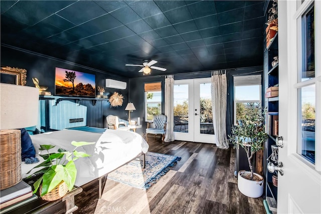 sunroom / solarium featuring french doors, ceiling fan, and an AC wall unit