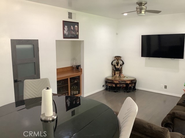 living room with ceiling fan