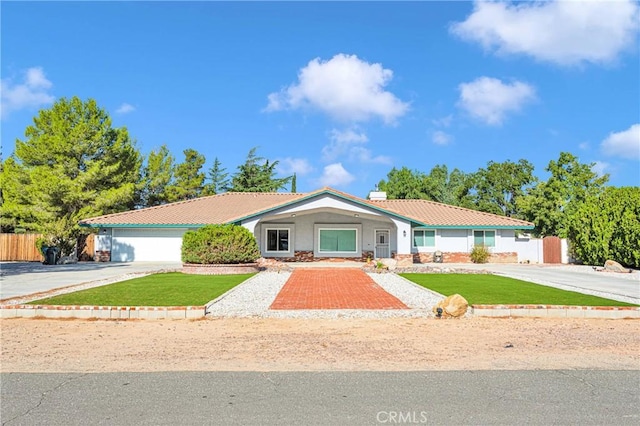 single story home with a garage