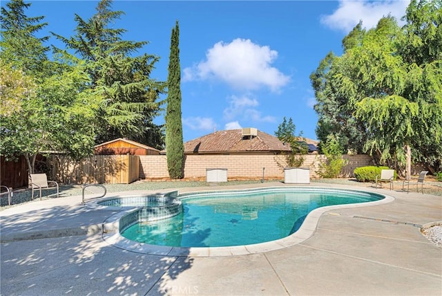 view of pool featuring a patio area