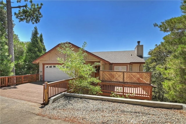 view of front of property with a wooden deck