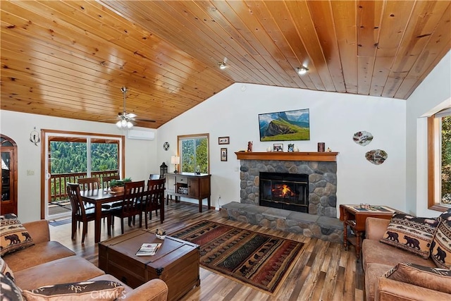 living room with wooden ceiling, a fireplace, a healthy amount of sunlight, and wood-type flooring