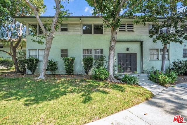 view of property with a front yard