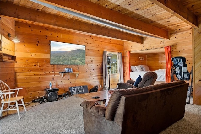 carpeted living room with wood ceiling, wood walls, and beam ceiling