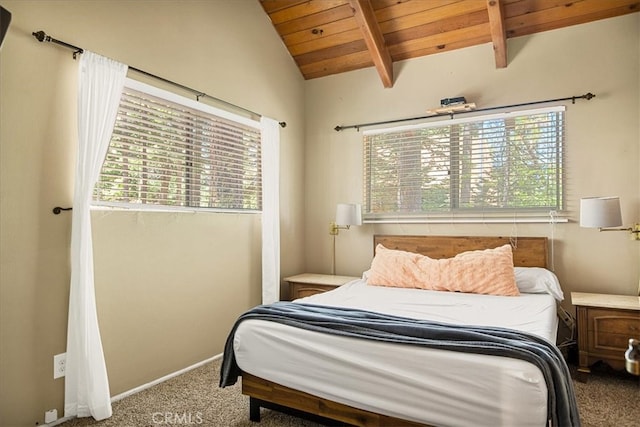 carpeted bedroom with lofted ceiling with beams and wooden ceiling