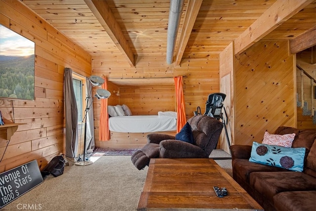 carpeted bedroom with beamed ceiling, wooden walls, and wood ceiling