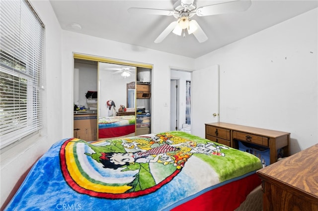 bedroom with a closet and ceiling fan