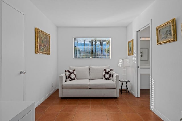 sitting room featuring light tile patterned flooring