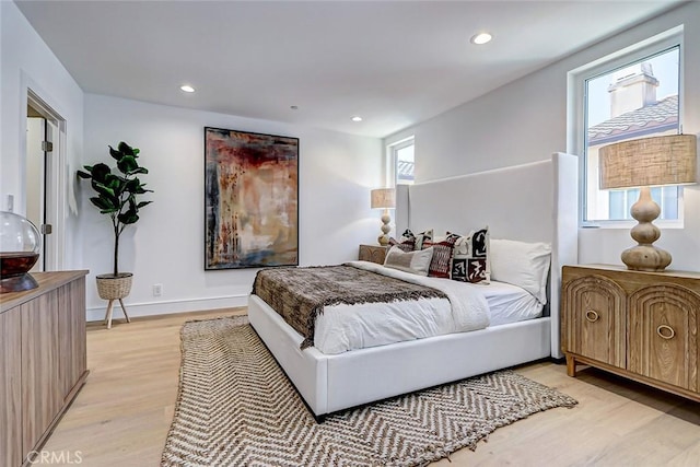 2304 Grant Ave Unit A, Redondo Beach, CA 90278 - bedroom with light wood finished floors, recessed lighting, and baseboards