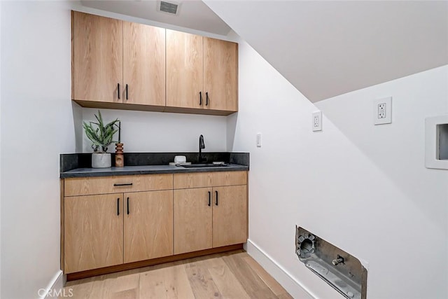2304 Grant Ave Unit A, Redondo Beach, CA 90278 - bar featuring a sink, light wood finished floors, and baseboards
