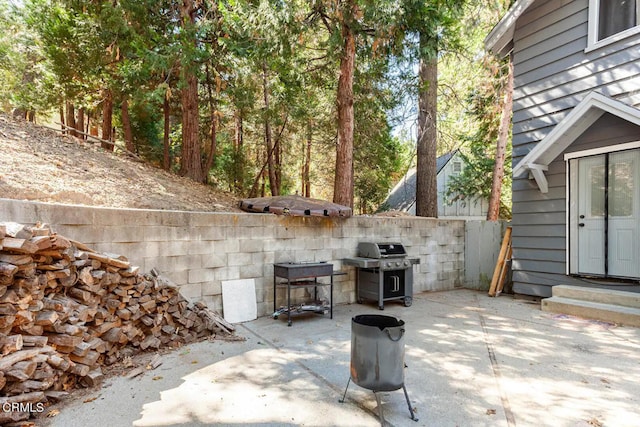 view of patio featuring a grill