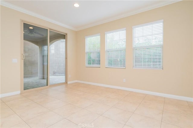 tiled empty room with crown molding