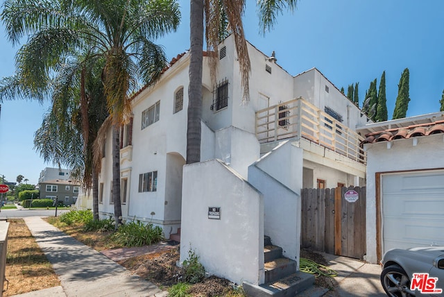 view of property exterior featuring a garage