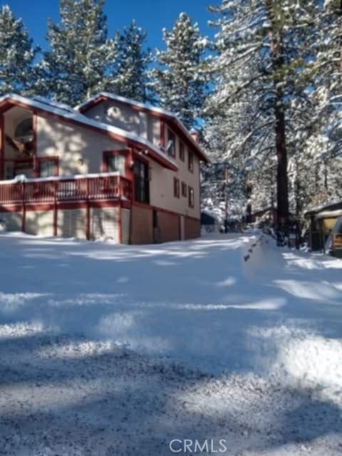 view of snow covered property