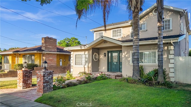 view of front of house with a front lawn