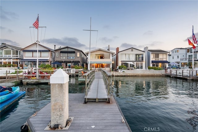 dock area featuring a water view