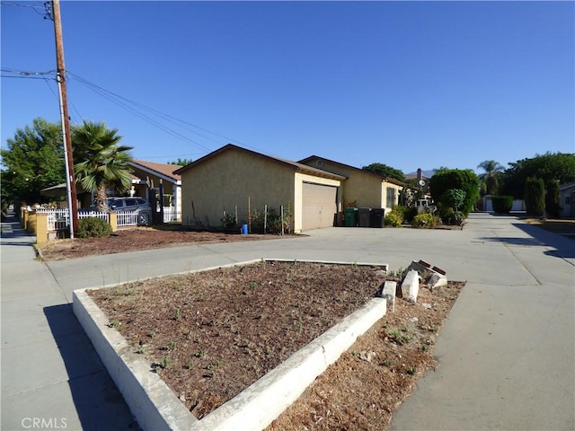 exterior space with a garage