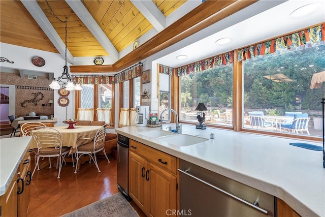 kitchen with wooden ceiling, lofted ceiling with beams, dishwasher, hanging light fixtures, and sink