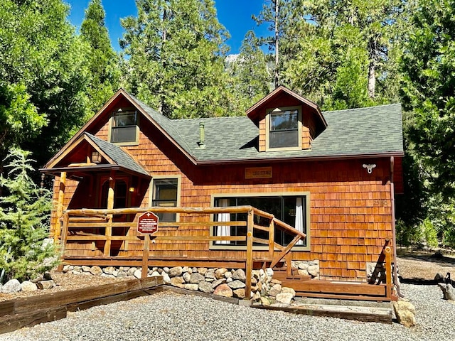 exterior space featuring a wooden deck