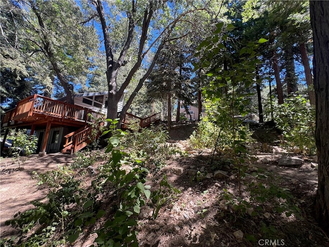 view of yard with a deck