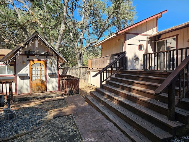 exterior space with a patio area and a wooden deck