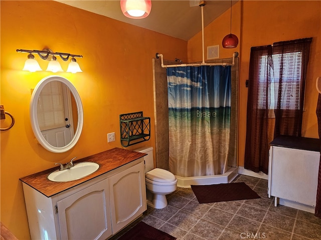 bathroom featuring toilet, tile patterned floors, walk in shower, vaulted ceiling, and vanity