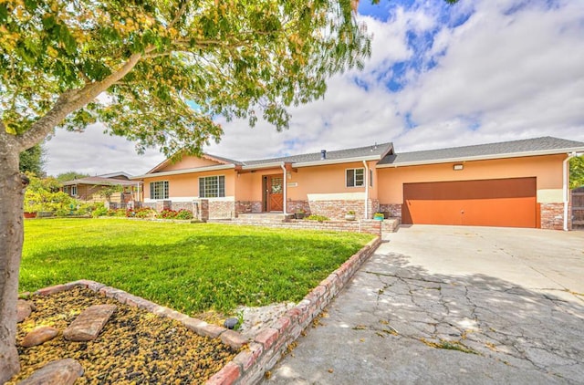 single story home featuring a garage and a front lawn