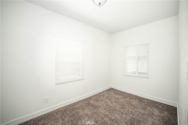 view of carpeted spare room