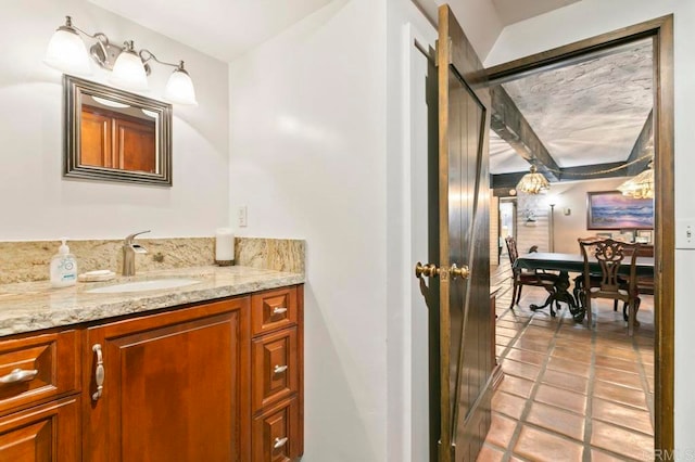 bathroom featuring vanity and tile patterned flooring