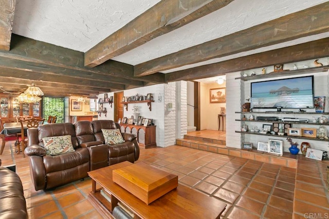 tiled living room featuring beam ceiling and a textured ceiling