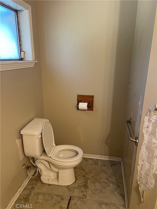 bathroom featuring toilet