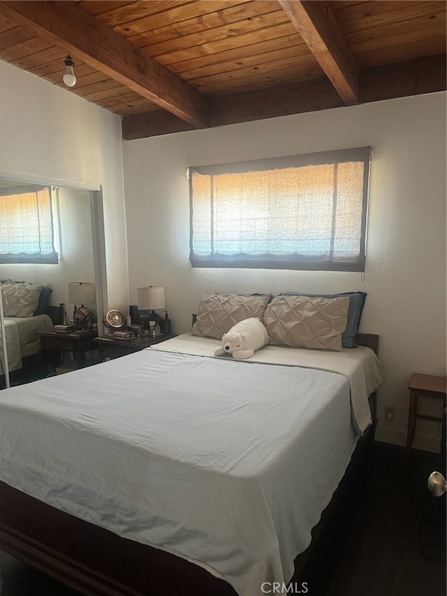 bedroom featuring wood-type flooring, wood ceiling, and beamed ceiling