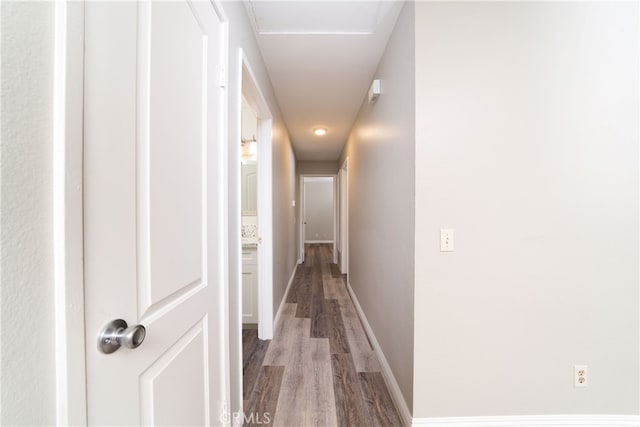 hallway featuring hardwood / wood-style flooring