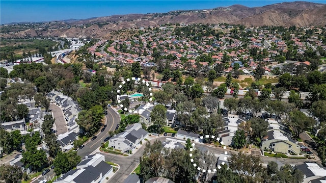 drone / aerial view featuring a mountain view