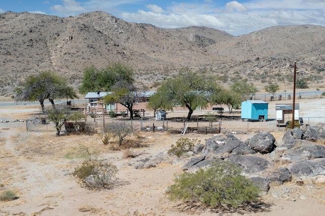 view of mountain feature with a rural view