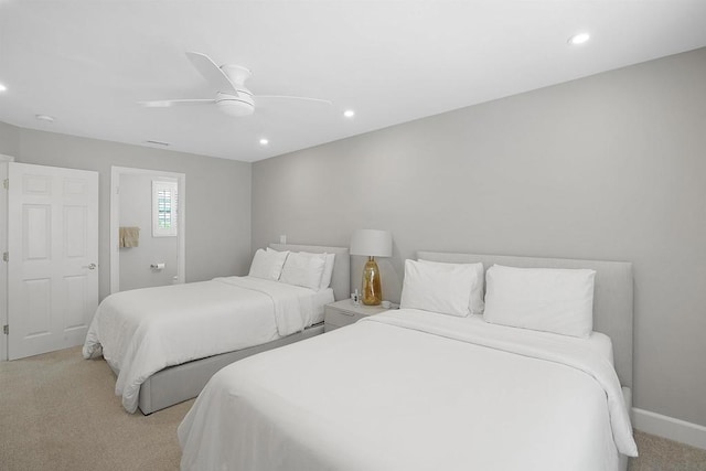 bedroom with light carpet and ceiling fan