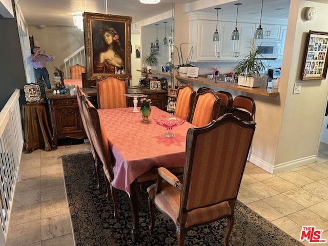 dining room with light tile patterned floors