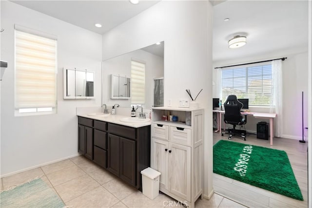 bathroom featuring vanity and tile patterned flooring