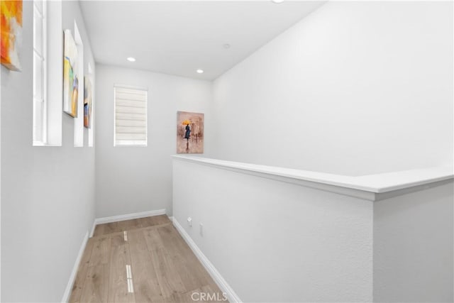 hallway featuring light hardwood / wood-style floors