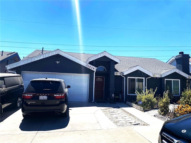 single story home with a garage