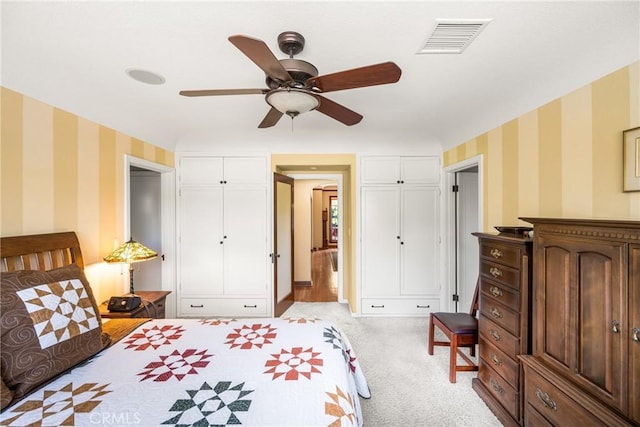 carpeted bedroom with ceiling fan