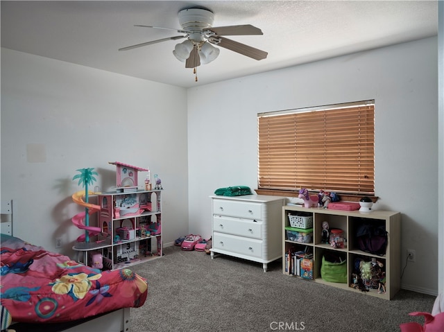 interior space with ceiling fan and carpet