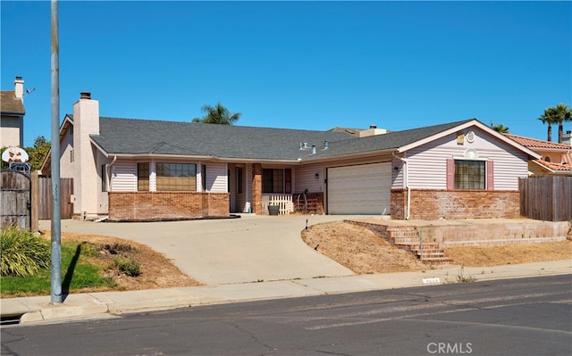 ranch-style home with a garage